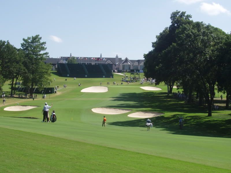 Players finish their round at the 18th at Southern hills in the 2007 PGA Championship