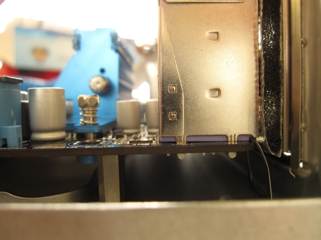 Motherboard will not align with standoffs or go into i/o panel PC/Mac