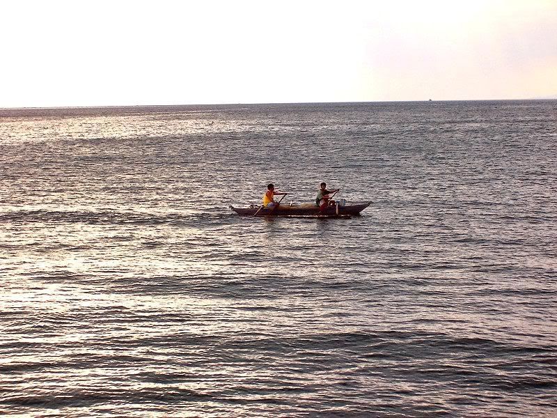 two men on a boat