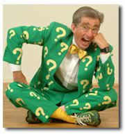 Riddle me this: if I'm a millionaire, why can't I afford a normal suit?