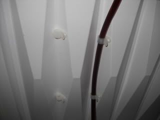 Hoses kept out of the way