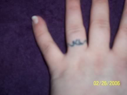 wedding ring tattoo. a wedding ring tattoo.
