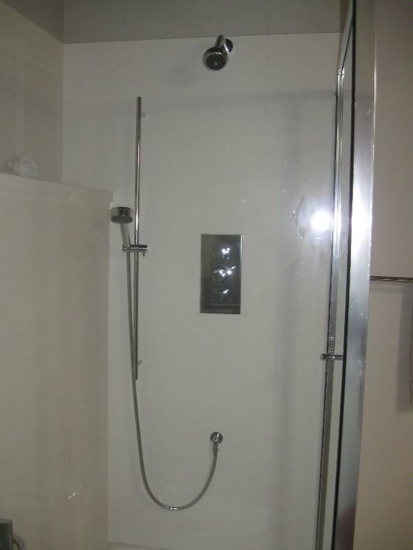 Help? Access panel for shower plumbing how big
